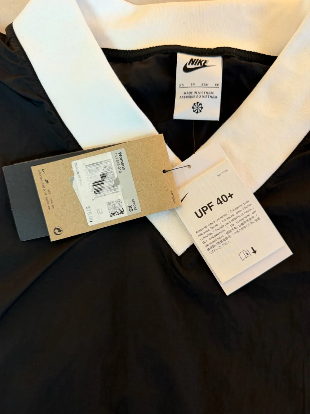 Nike Sportswear Essential Women's Loose UV Woven Long-Sleeve V- Neck sweater top